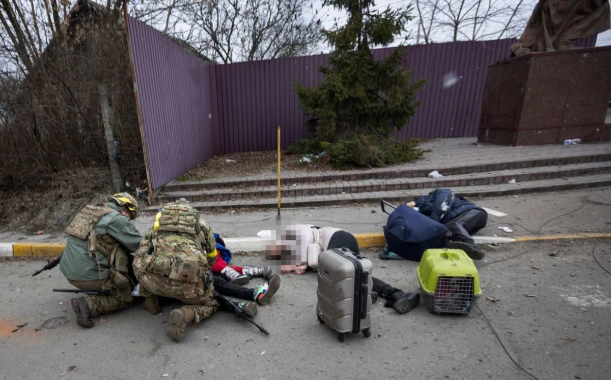 Ukrainians flee Russian bombs as civilians are killed in small Kyiv suburb