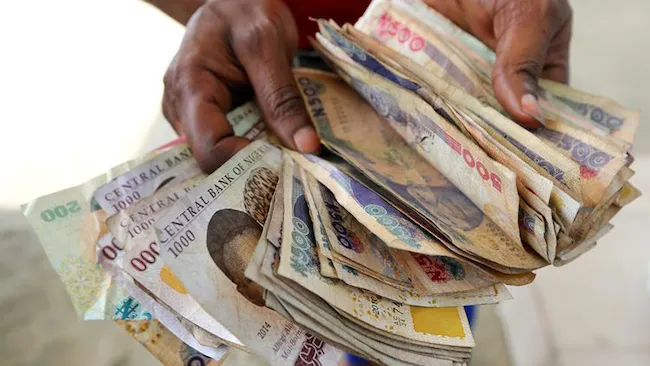 CBN tells Nigerians to reject old naira notes from banks
