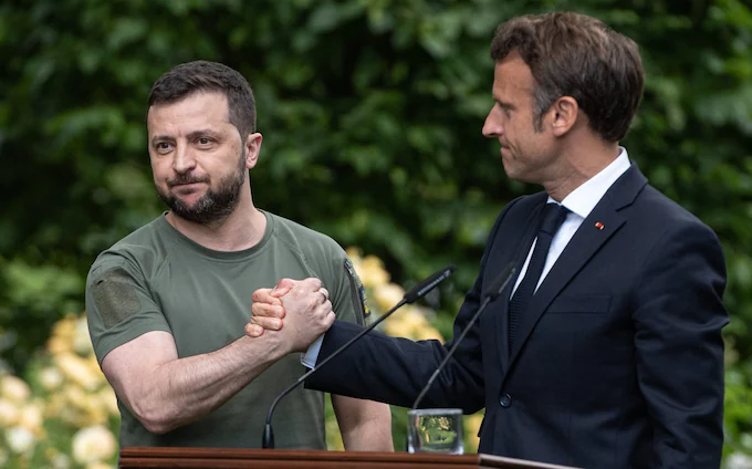 Macron, Zelensky To Travel Together For EU Summit In Brussels
