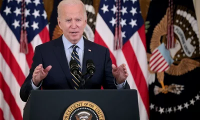 Biden brushes off House impeachment inquiry and says Republicans want to shut down the government