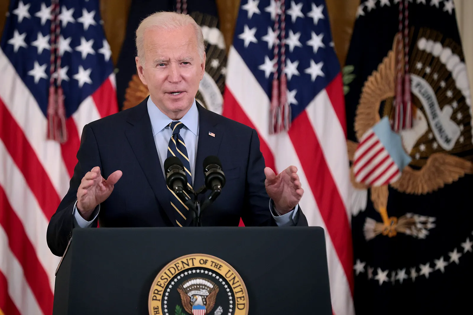 Biden brushes off House impeachment inquiry and says Republicans want to shut down the government