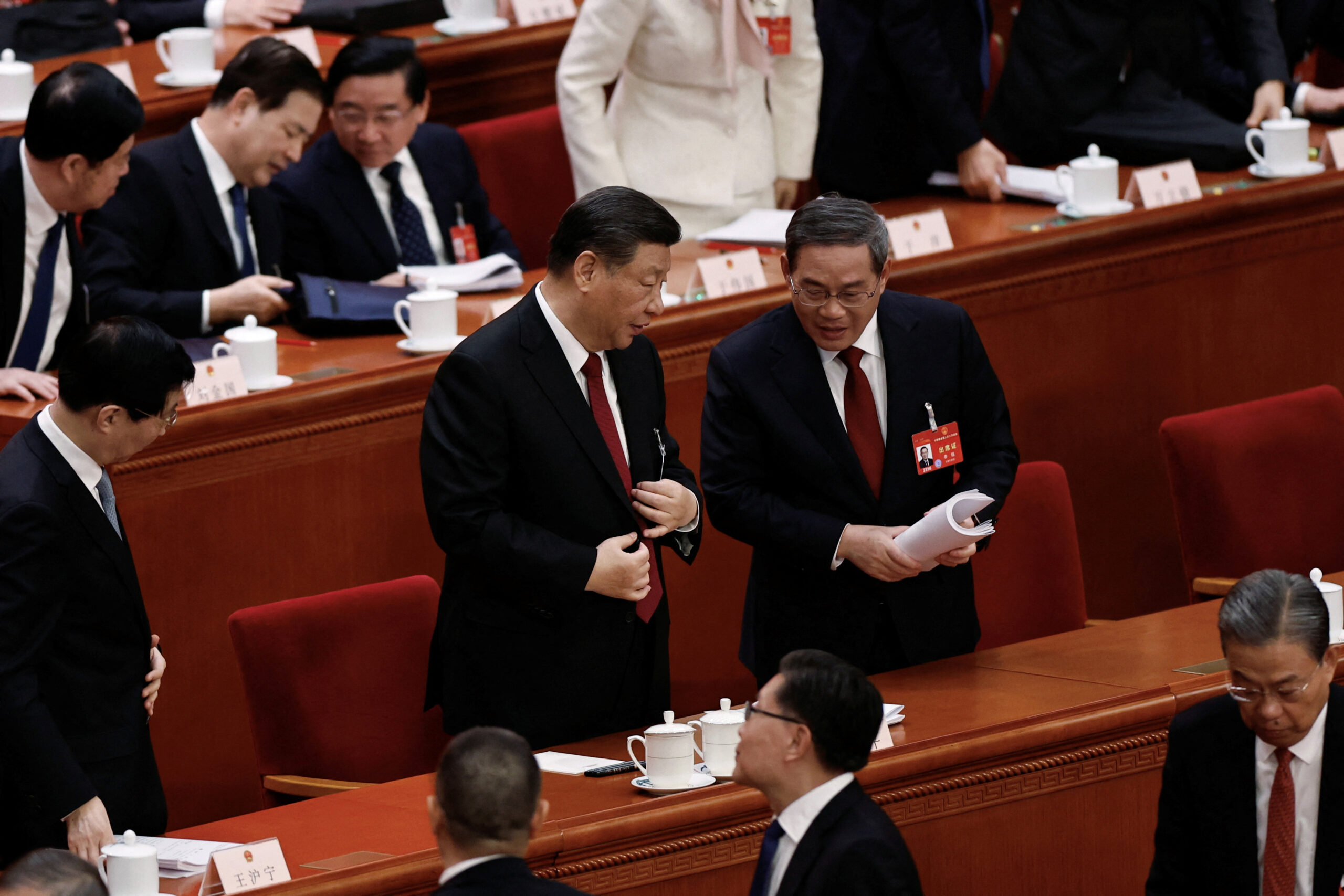 China vows to 'transform' economy, sets ambitious growth target