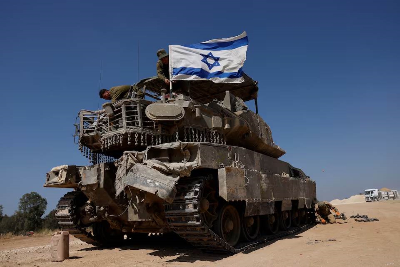 Israeli military vows response to Iran attack as calls for restraint mount