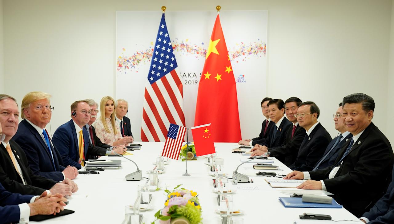 U.S. President Donald Trump said on Thursday he had agreed with President Xi Jinping to trim tariffs on China in exchange for Beijing cracking down on the illicit fentanyl trade, resuming U.S. soybean purchases and keeping rare earths exports flowing. Trump's face-to-face talks with Xi in the South Korean city of Busan, their first since 2019, marked the finale of a whirlwind Asia trip on which he also touted trade breakthroughs with South Korea, Japan and Southeast Asian nations. The deal, according to Beijing, also included a U.S. pledge to delay for a year a new measure -- strongly opposed by China -- to bar thousands of Chinese firms from receiving U.S. technology if they are part-owned by a sanctioned company. "It was an amazing meeting," Trump told reporters aboard Air Force One shortly after he left South Korea, ranking the talks a "12 out of 10". Trump said tariffs on Chinese imports would be cut to 47% from 57%, by halving to 10% the rate of tariffs related to trade in fentanyl precursor drugs. Xi will work "very hard to stop the flow" of fentanyl, a deadly synthetic opioid that is the leading cause of American overdose deaths, Trump said. China agreed to pause export controls unveiled this month on rare earths, elements with vital roles in cars, planes and weapons that have become Beijing's most potent source of leverage in its trade war with the United States. The pause would last for a year, China's commerce ministry said in a statement. China agreed to buy 12 million metric tons of U.S. soybeans through January, and to purchase 25 million tons annually for the next three years, U.S. Treasury Secretary Scott Bessent told Fox Business Channel's "Mornings with Maria" program. He said China had approved an agreement to bring short video app TikTok under U.S.-controlled ownership, and he expected it to move forward in coming months. China also agreed to purchase oil and gas from the U.S., Trump said in a Truth Social post. Bessent later said Xi also unilaterally expressed interest in participating in a new U.S. pipeline being built in Alaska, but gave no details. Washington, meanwhile, will suspend for one year new Entity List restrictions that make it harder for Chinese firms to use affiliates to buy off-limits technology, as well as suspending measures targeting China's maritime logistics and shipbuilding sector, Bessent said. Trade experts said the agreement offered a one-year reprieve from tensions that have weighed on global growth, but cautioned that China had failed to meet its purchase agreements under the Phase 1 trade deal signed during Trump's first term, and geopolitical tensions could reignite the trade war at any time. "The tariff cut in exchange for a promised fentanyl crackdown buys temporary calm, but it’s transactional relief —not a structural reset," said Craig Singleton, senior China fellow at the non-partisan Foundation for Defense of Democracies. "Each side is calibrating tension to avoid collapse while keeping escalation on the table. Nothing fundamental changed, and the cycle of coercion will resume the moment one side feels shortchanged,” he said. MUTED RESPONSE FROM GLOBAL MARKETS Trump's meeting with Xi followed a summit with South Korean President Lee Jae Myung, where the two allies said they had finalised most details on a tariff deal they had been wrangling over for months. The reaction to the detente was muted in global stock markets that had hit records ahead of the meeting on hopes of a breakthrough in a trade war between the world's two largest economies that has disrupted supply chains and rocked global business confidence. Trump repeatedly talked up prospects of reaching agreement with Xi since U.S. negotiators on Sunday said they had agreed a framework with China to avoid 100% U.S. tariffs on its goods and defer China's export curbs on rare earths. U.S. Senate Democratic Leader Chuck Schumer, in a post on X Thursday, said Trump's statements on the summit should not be believed. "Trump folded on China," he wrote. The cordial meeting between the leaders, at a South Korean air base on the sidelines of the Asia-Pacific Economic Cooperation (APEC) forum, lasted more than 1-1/2 hours. FRICTIONS NOW AND THEN ARE NORMAL It was normal for the two sides to have frictions now and then, Xi told Trump via a translator, as they faced each other, flanked by their delegations. "China's development and rejuvenation are not incompatible with President Trump's goal of 'Making America Great Again,'" Xi added. They also agreed to pause tit-for-tat port fees on shipping, designed to thwart dominance in shipbuilding, ocean freight and logistics. China will begin the process of purchasing U.S. energy, Trump said in a post on Truth Social on Thursday, hinting at a big deal in Alaska where his administration has been touting a proposed $44-billion LNG export project. Trump said he would travel to China in April before he receives Xi in the United States. Chinese state media portrayed the meeting as a triumph of Xi's policymaking. "We have the confidence and capability to navigate all kinds of risks and challenges," the official news agency, Xinhua, quoted him as saying. NO NVIDIA CHIP, TAIWAN DISCUSSIONS The agreement broadly returns ties to their status before Trump's "Liberation Day" offensive in April triggered tit-for-tat escalation and leaves only Brazil and India facing higher tariffs among major U.S. trading partners. But it may be no more than a fragile truce in a trade war with root causes still unresolved, analysts say. Trump said he did not discuss Nvidia's state-of-the-art Blackwell chip with Xi, in a further blow to the firm's hopes of maintaining its presence in China's $50-billion AI market. The contentious issue of Taiwan, the democratic island claimed by China that is a U.S. partner and high-tech powerhouse, also did not surface in the talks, Trump said. Minutes before starting the meeting, Trump ordered the U.S. military to resume testing nuclear weapons after a gap of 33 years, pointing to the growing arsenals of Russia and China. China's foreign ministry said on Thursday it hoped the U.S. would stick to a moratorium on nuclear testing.